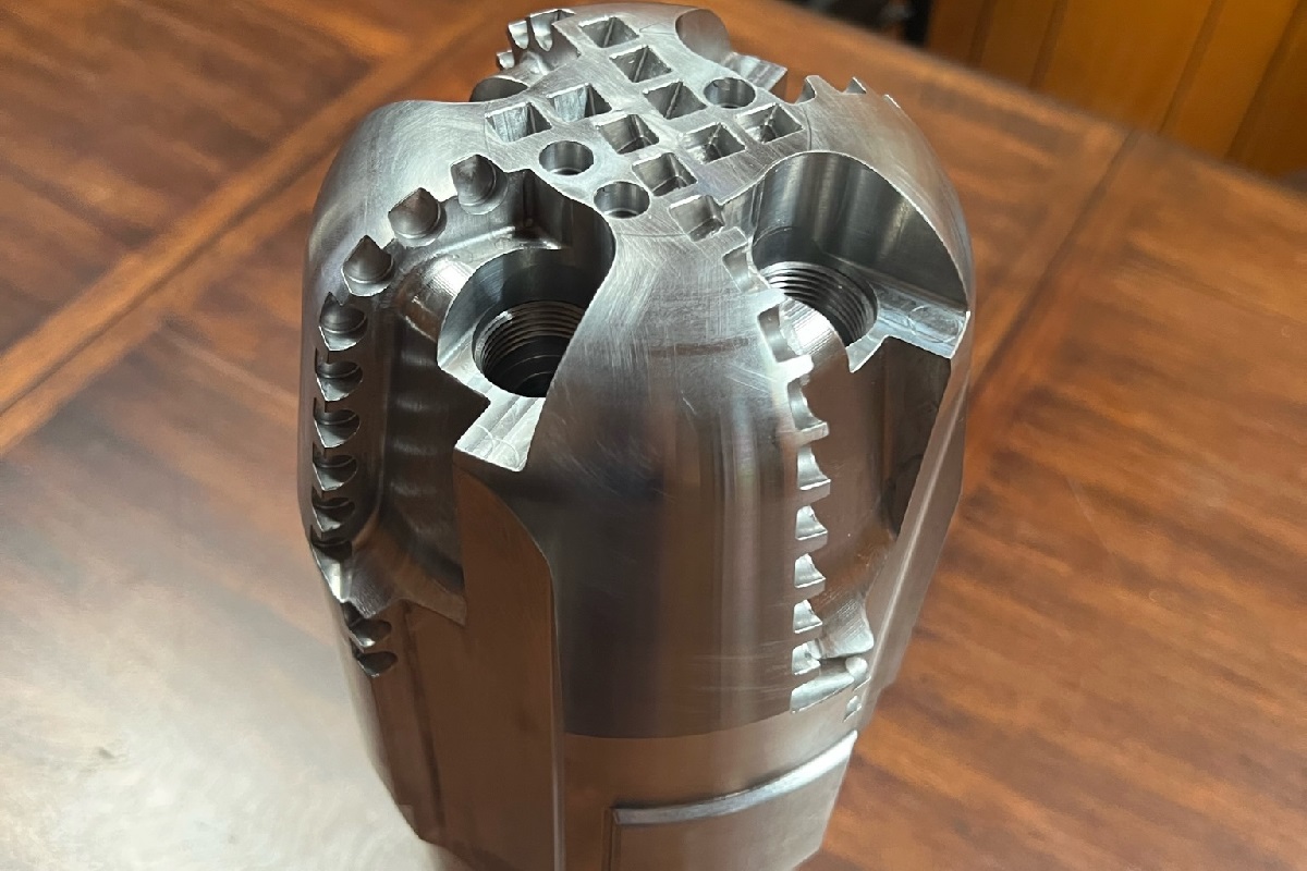 Brass parts being machined on a lathe