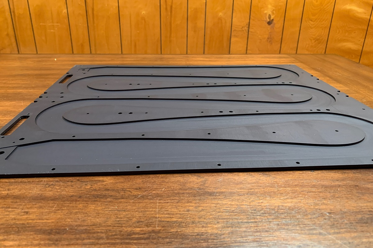 Brass parts being machined on a lathe