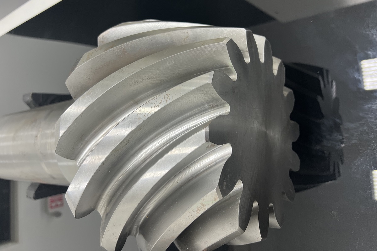 Brass parts being machined on a lathe