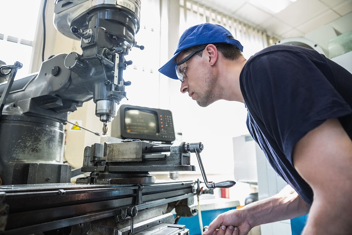 Brass parts being machined on a lathe
