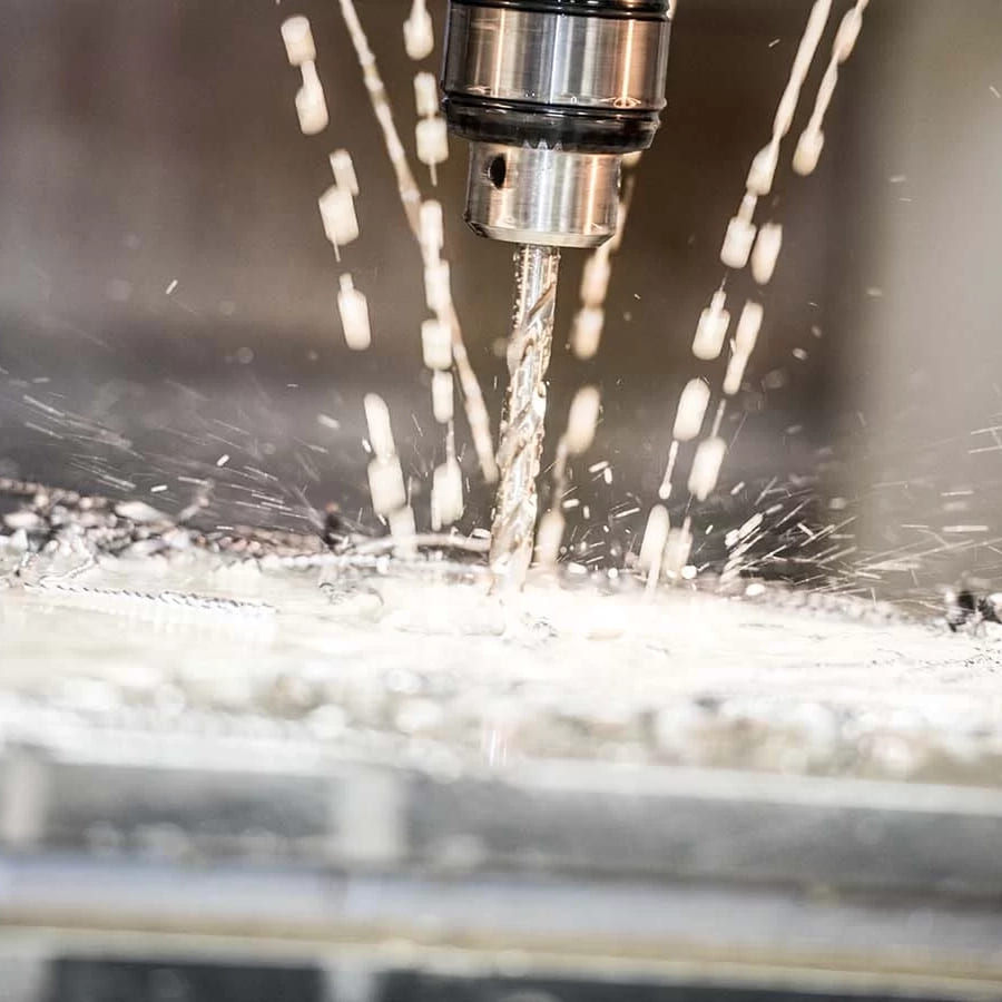 A CNC machine milling a metal part
